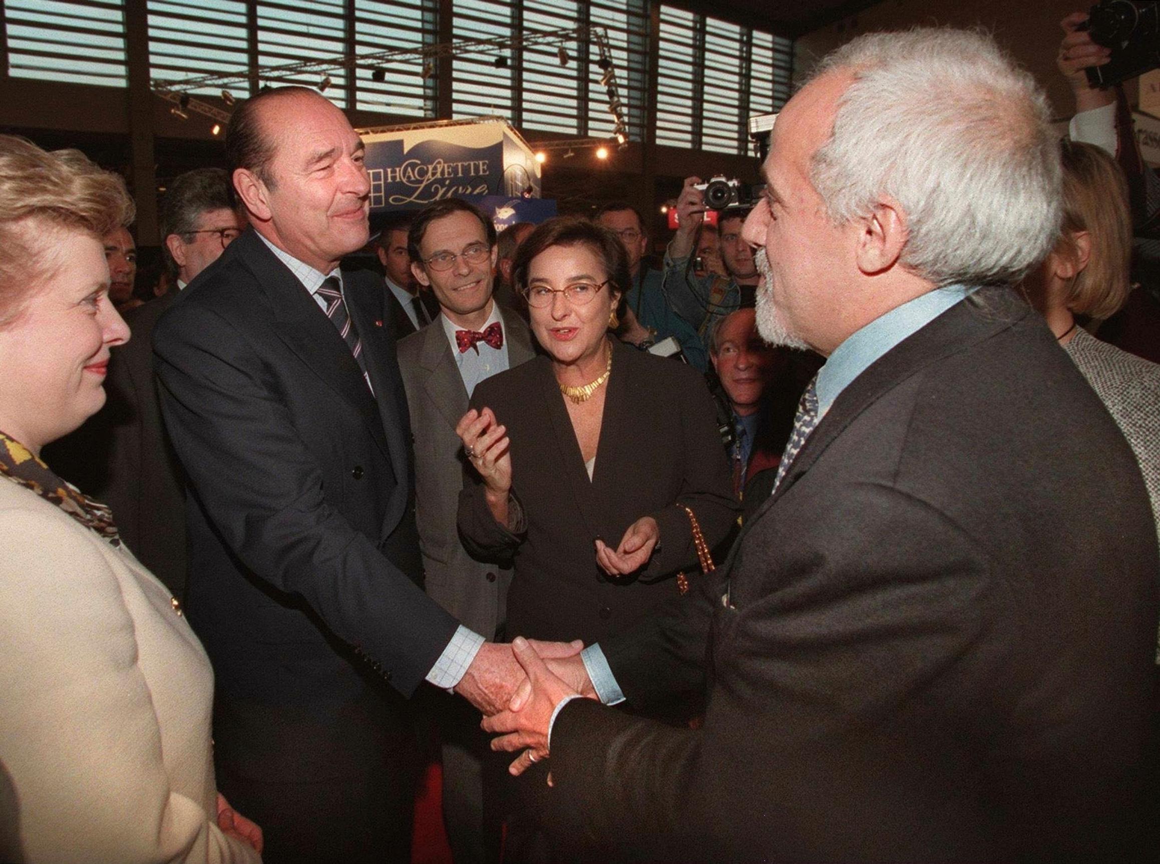 Paulo Coelho Ranskan entinen presidentin Jacques Chirac ja antropologi Ruth Cardoso.